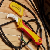 Нож монтажника Rexant нержавеющая сталь изогнутое лезвие 1000V