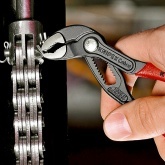 Клещи переставные Knipex Cobra 1 дюйм 27мм фосфатированные 1-к ручки L-125мм
