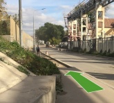 При выходе на улицу налево