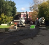 За бетонным заводом правее