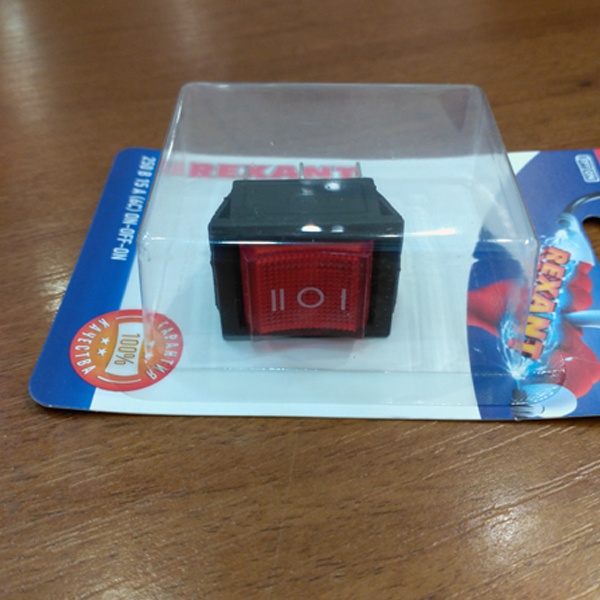 Красный рокерный переключатель Рексант на 3 положения со световой индикацией в блистере, 6 контактов на 15 Ампер