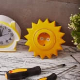 Розетка одноместная Kranz HAPPY Солнце скрытой установки с заземлением и защитными шторками, желтая