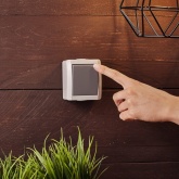 Выключатель одноклавишный открытой установки Kranz Industrial IP54 серый