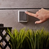 Выключатель двухклавишный открытой установки Kranz Industrial IP54 серый