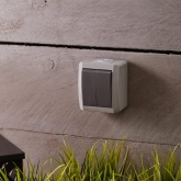 Выключатель двухклавишный открытой установки Kranz Industrial IP54 серый