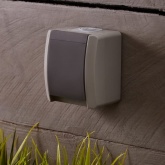 Розетка Kranz Industrial одноместная открытой установки с заземлением 2П+3 IP54 серый