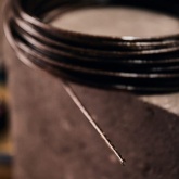 Трос стальной Rexant d2.5 мм в черной ПВХ изоляции, моток 20 метров