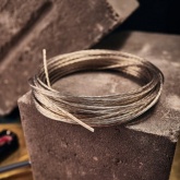 Трос стальной Rexant d2.5 мм в ПВХ изоляции, моток 20 метров