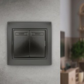 Выключатель двухклавишный с подсветкой Intro 10А 250В IP20 Plano, антрацит 1-105-05