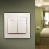 Выключатель двухклавишный с подсветкой Intro 10А 250В IP20 Plano, слоновая кость 1-105-02 (бежевый)