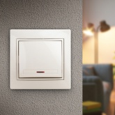 Выключатель с подсветкой Intro 10А 250В IP20 Plano, слоновая кость 1-102-02 (бежевый)