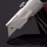 Нож Rexant с трапециевидным выдвижным лезвием