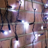 Гирлянда Айсикл (Бахрома) 4,8х0,6м, с эффектом мерцания, черный провод, 230В, белые 176LED IP65