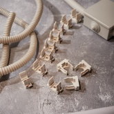 Крепеж-клипса Rexant для труб под монтажный пистолет в п/э d20 [упак.100шт] серая