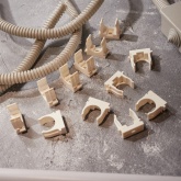 Крепеж-клипса Rexant для труб под монтажный пистолет в п/э d25 [упак.50шт] белая