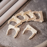 Крепеж-клипса Rexant для труб под монтажный пистолет в п/э d32 [упак.50шт] белая