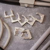 Крепеж-клипса Rexant для труб под монтажный пистолет в п/э d40 [упак.25шт] серая