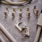 Крепеж-клипса Rexant для труб под монтажный пистолет в п/э d40 [упак.25шт] серая