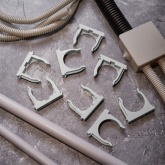 Крепеж-клипса Rexant для труб под монтажный пистолет в п/э d50 [упак.25шт] серая