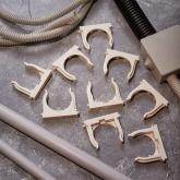 Крепеж-клипса Rexant для труб под монтажный пистолет в п/э d50 [упак.25шт] белая