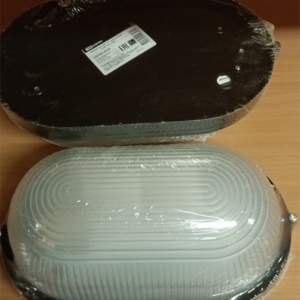 Влагозащищенный светильник ТДМ для бань и ЖКХ, овальной формы, с цоколем E27, максимальной мощностью лампы 100 Ватт, черный цвет