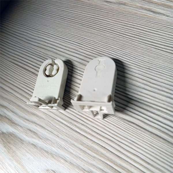 Сквозной патрон G13 с боковыми защёлками без стопора для линейных люминесцентных ламп Т8.