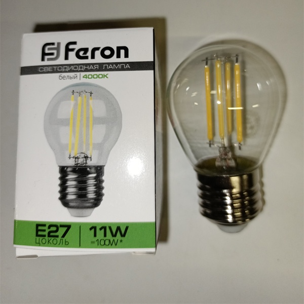 Филаментная лампочка шарик Ферон с нитевидными светодиодами, мощностью 11 Ватт, с цоколем E27, нейтральный белый свет, прозрачная колба