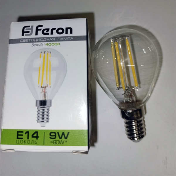 Филаментная лампочка шарик Ферон с нитевидными светодиодами, мощностью 9 Ватт, с цоколем E14, нейтральный белый свет, прозрачная колба