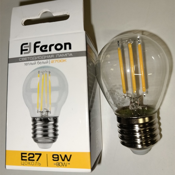 Филаментная лампочка шарик Ферон с нитевидными светодиодами, мощностью 9 Ватт, с цоколем E27, теплый свет, прозрачная колба