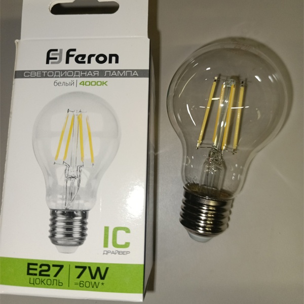 Филаментная лампочка груша с нитевидными светодиодами мощностью 7 Вт с цоколем E27 нейтральный белый свет прозрачная колба