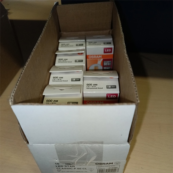 Филаментная лампочка шарик Осрам с нитевидными светодиодами, мощностью 5 Ватт, с цоколем E14 (миньон), нейтральный белый свет, прозрачная колба