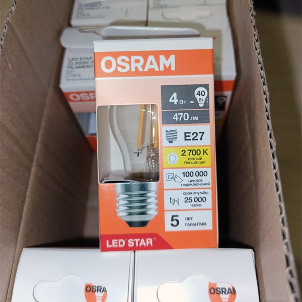 Филаментная лампочка формы шарик с нитевидными светодиодами Осрам мощностью 4 Ватта, с цоколем E27, теплый свет, прозрачная колба
