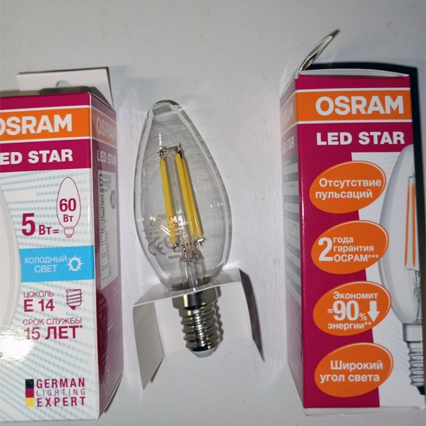 Энергосберегающая LED лампочка свеча с нитевидными светодиодами, мощностью 5 Ватт, с цоколем E14, нейтральный белый свет, прозрачная колба