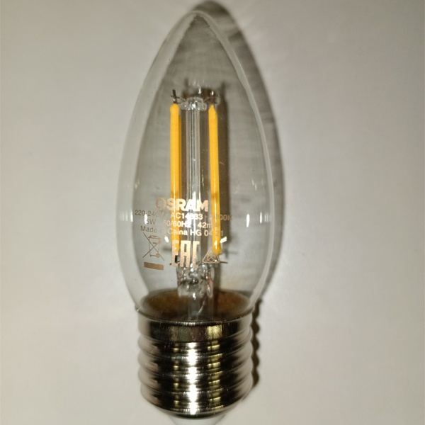 Энергосберегающая LED лампочка свеча с нитевидными светодиодами, мощностью 5 Ватт, с цоколем E27, теплый свет, прозрачная колба