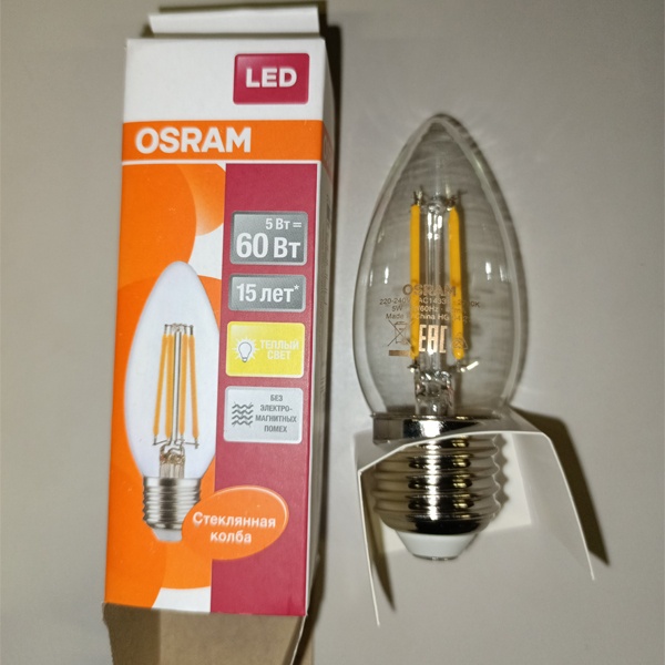 Энергосберегающая LED лампочка свеча с нитевидными светодиодами, мощностью 5 Ватт, с цоколем E27, теплый свет, прозрачная колба