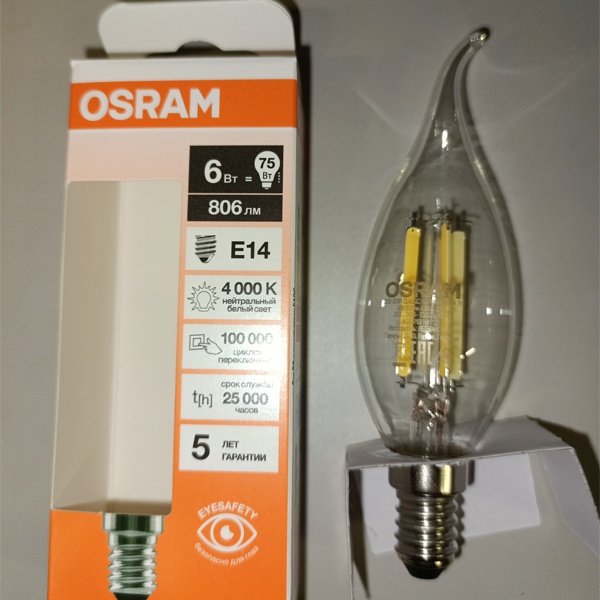 Филаментная лампочка формы свеча на ветру с нитевидными светодиодами Осрам мощностью 6 Ватт, с цоколем E14 (миньон), нейтральный белый свет, прозрачная колба
