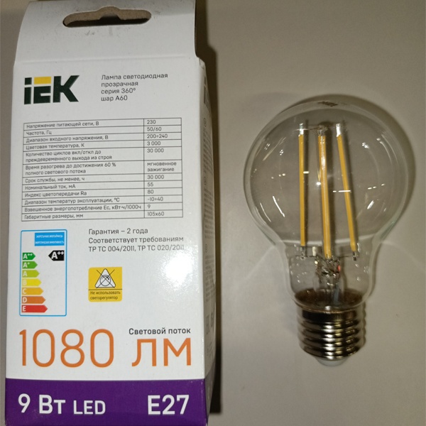 Филаментная лампочка груша с нитевидными светодиодами мощностью 9 Вт с цоколем E27 теплый белый свет прозрачная колба