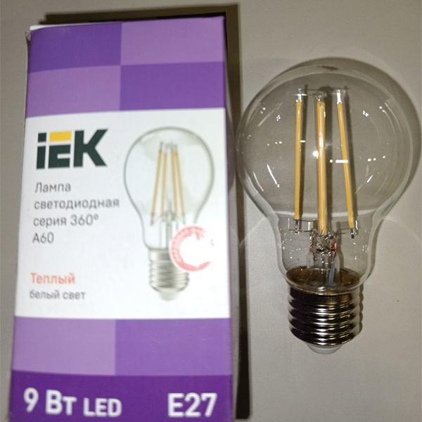 Филаментная лампочка груша с нитевидными светодиодами мощностью 9 Вт с цоколем E27 теплый белый свет прозрачная колба