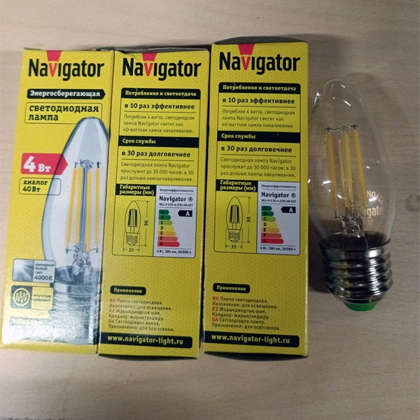 Энергосберегающая LED лампочка свеча с нитевидными светодиодами, мощностью 4 Ватта, с цоколем E27, нейтральный белый свет, прозрачная колба