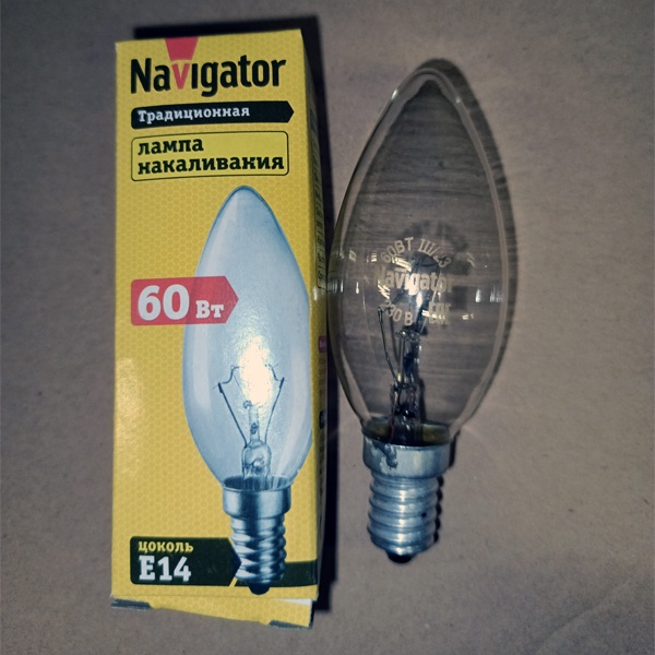 Обычная вольфрамовая лампа формы свеча мощностью 60 Вт на 220 Вольт с цоколем E14 миньон общего назначения