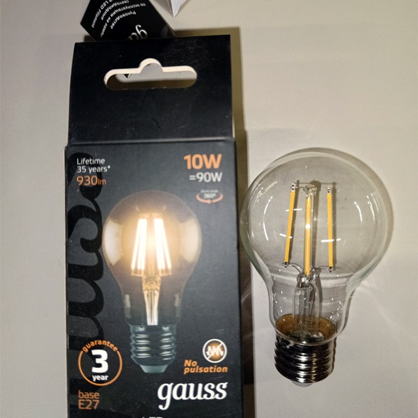 Энергосберегающая диммируемая LED лампочка с нитевидными светодиодами Груша с цоколем E27, мощностью 10 Ватт, теплый свет, прозрачная колба