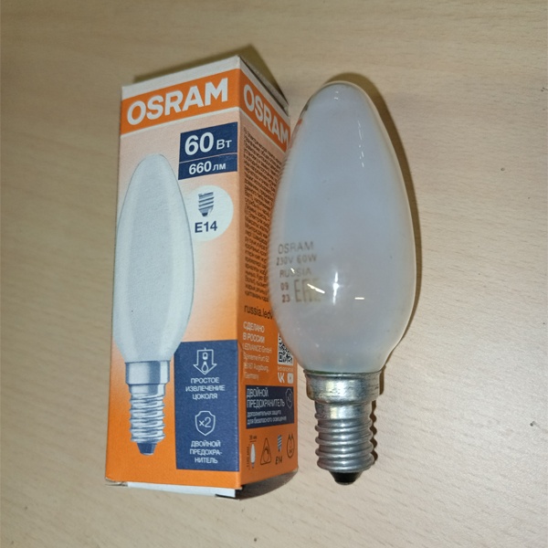 Обычная вольфрамовая лампа формы свеча мощностью 60 Вт на 220 Вольт с цоколем E14 миньон общего назначения