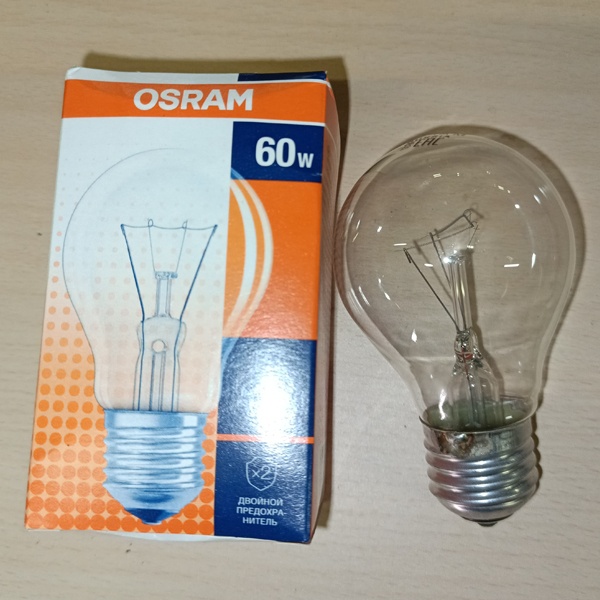 Обычная вольфрамовая лампа формы Груша мощностью 60 Вт на 220 Вольт с цоколем Е27 общего назначения