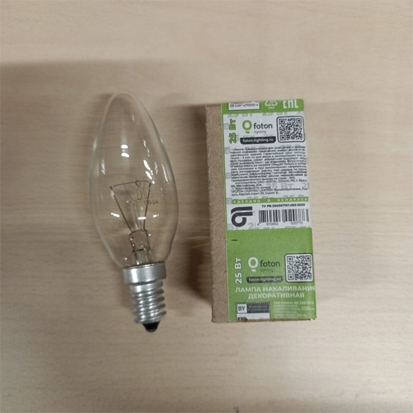 Обычная вольфрамовая лампа формы свеча мощностью 25 Вт на 220 Вольт с цоколем E14 миньон общего назначения
