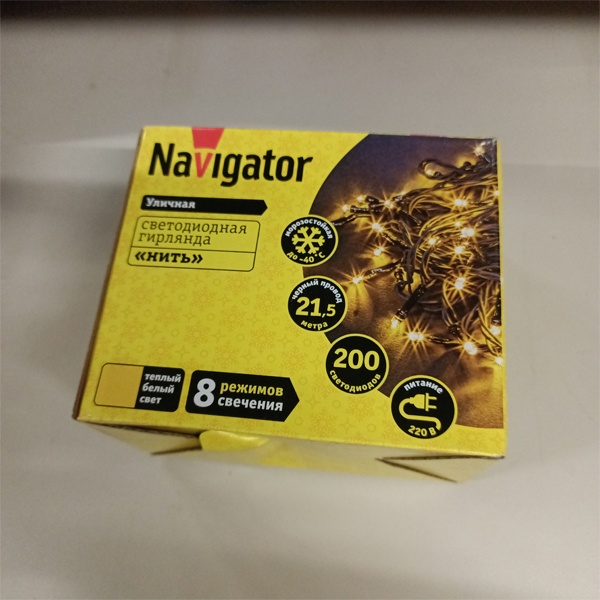 Светодиодная гирлянда Navigator Нить длиной 21.5 метра с проводом из черного каучука, теплый белый цвет светодиодов , 8 режимов свечения, 230 Вольт.