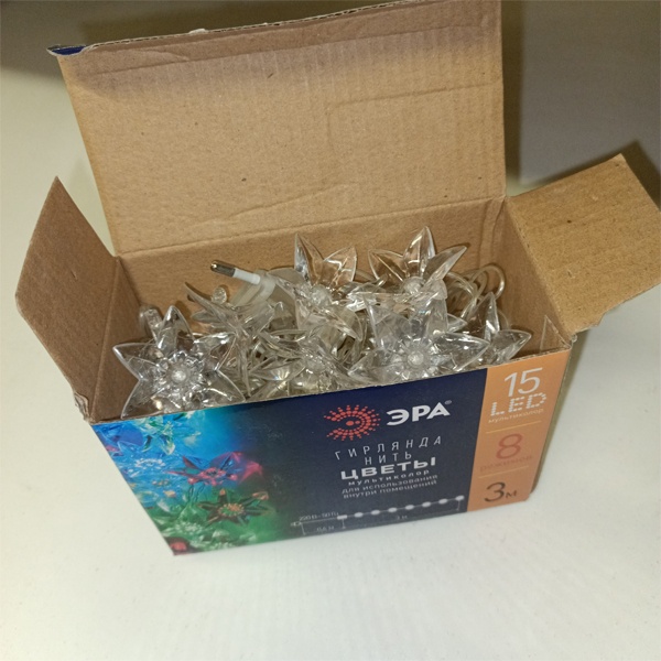 Светодиодная гирлянда Нить Цветы, 3 метра, 20 LED мультиколор, с контроллером 8 режимов, работа от сети 220 Вольт, ЭРА